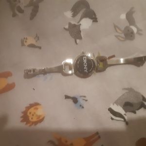 DKNY sunglasses and watches and vera pelle wallet